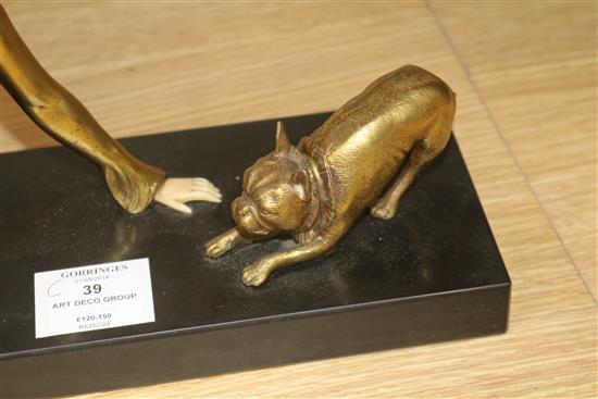 An Art Deco lady and dog figure group, on black marble base width 45cm height 19cm